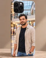 A phone case printed with a photo, standing on a marble surface